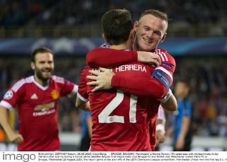 - BRUGGE, BELGIUM: Manchester s Wayne Rooney (R) celebrates with his teammate Ander Herrera after scoring during a soccer game between Belgian first league team Club Brugge KV and British club Manchester United ManU FC in Brugge, Wednesday 26 August 2015, the return game of the play-offs of the UEFA Champions League competition. Manchester United won the first leg 3-1. KURTxDESPLENTER  x04687599x