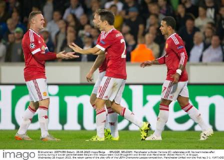 - BRUGGE, BELGIUM: Manchester s Ander Herrera (C) celebrates with his teammates after scoring during a soccer game between Belgian first league team Club Brugge KV and British club Manchester United ManU FC in Brugge, Wednesday 26 August 2015, the return game of the play-offs of the UEFA Champions League competition. Manchester United won the first leg 3-1. KURTxDESPLENTER  x04687661x