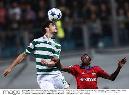 MOSCOW REGION, RUSSIA. AUGUST 26, 2015. Sporting s Paulo Oliveira (L) and CSKA s Ahmed Musa jump to head the ball in their UEFA Champions League play-off series football match at Arena Khimki. CSKA Moscow won the game 3-1. Artyom Korotayev TASS  TS00B842