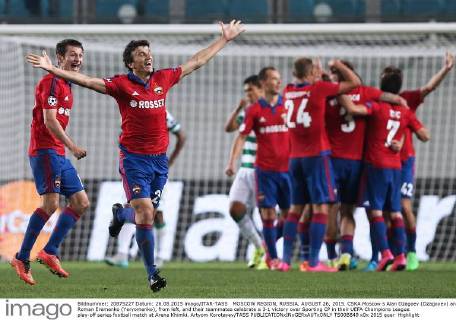 MOSCOW REGION, RUSSIA. AUGUST 26, 2015. CSKA Moscow s Alan Dzagoev (Dzagoyev) and Roman Eremenko (Yeryomenko), from left, and their teammates celebrate a 3-1 victory over Sporting CP in their UEFA Champions League play-off series football match at Arena Khimki. Artyom Korotayev TASS  TS00B849