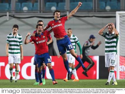 MOSCOW REGION, RUSSIA. AUGUST 26, 2015. CSKA Moscow s Alan Dzagoev (Dzagoyev), 10, Roman Eremenko (Yeryomenko), 25, and their unidentified teammate celebrate a 3-1 victory over Sporting CP in their UEFA Champions League play-off series football match at Arena Khimki. Artyom Korotayev TASS  TS00B848