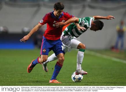 MOSCOW REGION, RUSSIA. AUGUST 26, 2015. CSKA Moscow s Alan Dzagoev (Dzagoyev), left, and Sporting s Jonathan Silva in action in their UEFA Champions League play-off series football match at Arena Khimki. CSKA Moscow won the game 3-1. Artyom Korotayev TASS  TS00B834