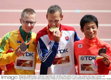 BEIJING, CHINA. AUGUST 29, 2015. Silver medalist Jared Tallent of Australia, gold medalist Matej Toth of Slovakia, and bronze medalist Takayuki Tanii of Japan (L-R) pose at a victory ceremony for the men s 50km race walk final on Day 8 of the 15th IAAF World Championships in Athletics, at the National Stadium. Valery Sharifulin TASS  TS00BD0B