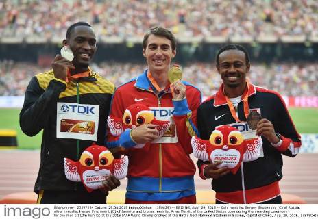 (150829) -- BEIJING, Aug. 29, 2015 -- Gold medalist Sergey Shubenkov (C) of Russia, silver medalist Hansle Parchment (C) of Jamaica and bronze medalist Aries Merritt of the United States pose during the awarding ceremony for the men s 110m hurdles at the 2015 IAAF World Championships at the Bird s Nest National Stadium in Beijing, capital of China, Aug. 29, 2015. ) (SP)CHINA-BEIJING-IAAF WORLD CHAMPIONSHIPS-MEN S 110M HURDLES AWARDING CEREMONY (CN) LixWen 