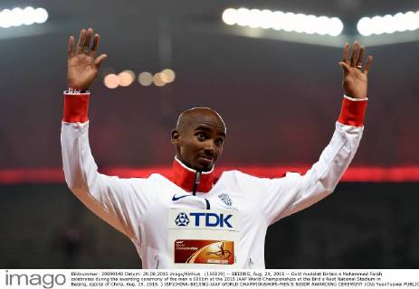 (150829) -- BEIJING, Aug. 29, 2015 -- Gold medalist Britain s Mohammed Farah celebrates during the awarding ceremony of the men s 5000m at the 2015 IAAF World Championships at the Bird s Nest National Stadium in Beijing, capital of China, Aug. 29, 2015. ) (SP)CHINA-BEIJING-IAAF WORLD CHAMPIONSHIPS-MEN S 5000M AWARDING CEREMONY (CN) YuexYuewei 