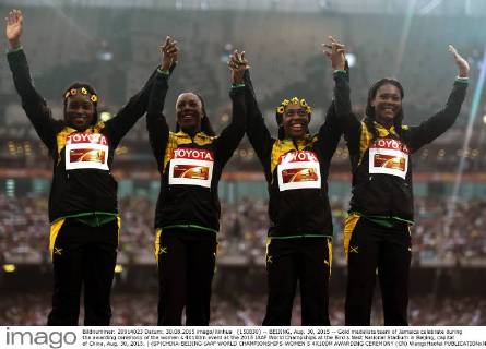 (150830) -- BEIJING, Aug. 30, 2015 -- Gold medalists team of Jamaica celebrate during the awarding ceremony of the women s 4X100m event at the 2015 IAAF World Champships at the Bird s Nest National Stadium in Beijing, capital of China, Aug. 30, 2015. ) (SP)CHINA-BEIJING-IAAF WORLD CHAMPIONSHIPS-WOMEN S 4X100M AWARDING CEREMONY (CN) WangxHaofei 