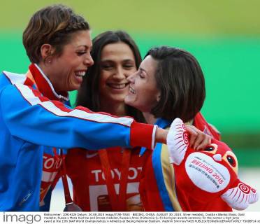 BEIJING, CHINA. AUGUST 30, 2015. Silver medalist, Croatia s Blanka Vlasic, Gold medalist, Russia s Maria Kuchina and Bronze medalist, Russia s Anna Chicherova (L-R) during an awards ceremony for the women s high jump event at the 15th IAAF World Championships in Athletics at Beijing National Stadium. Vladimir Smirnov TASS  TS00BF14