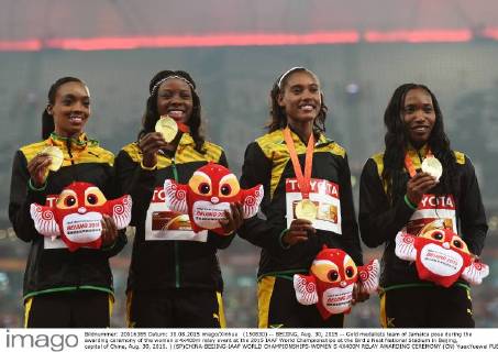 (150830) -- BEIJING, Aug. 30, 2015 -- Gold medalists team of Jamaica pose during the awarding ceremony of the women s 4x400m relay event at the 2015 IAAF World Championships at the Bird s Nest National Stadium in Beijing, capital of China, Aug. 30, 2015. ) (SP)CHINA-BEIJING-IAAF WORLD CHAMPIONSHIPS-WOMEN S 4X400M RELAY AWARDING CEREMONY (CN) YuexYuewei 