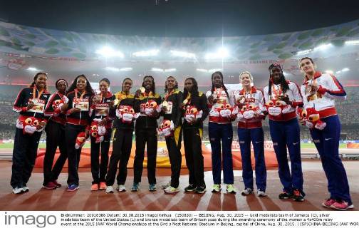 (150830) -- BEIJING, Aug. 30, 2015 -- Gold medalists team of Jamaica (C), silver medalists team of the United States (L) and bronze medalists team of Britain pose during the awarding ceremony of the women s 4x400m relay event at the 2015 IAAF World Championships at the Bird s Nest National Stadium in Beijing, capital of China, Aug. 30, 2015. ) (SP)CHINA-BEIJING-IAAF WORLD CHAMPIONSHIPS-WOMEN S 4X400M RELAY AWARDING CEREMONY (CN) YuexYuewei 