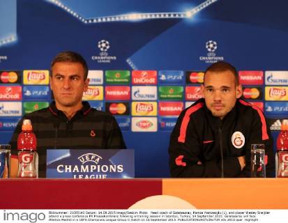 Head coach of Galatasaray, Hamza Hamzaoglu (L), and player Wesley Sneijder attend a press conference PK Pressekonferenz following a training session in Istanbul, Turkey, 14 September 2015. Galatasaray will face Atletico Medrid in a UEFA Champions League Group C match on 15 September 2015. 