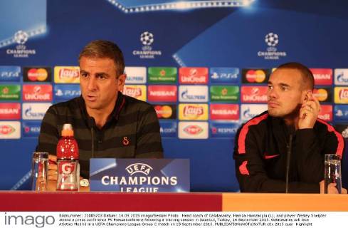Head coach of Galatasaray, Hamza Hamzaoglu (L), and player Wesley Sneijder attend a press conference PK Pressekonferenz following a training session in Istanbul, Turkey, 14 September 2015. Galatasaray will face Atletico Medrid in a UEFA Champions League Group C match on 15 September 2015. 