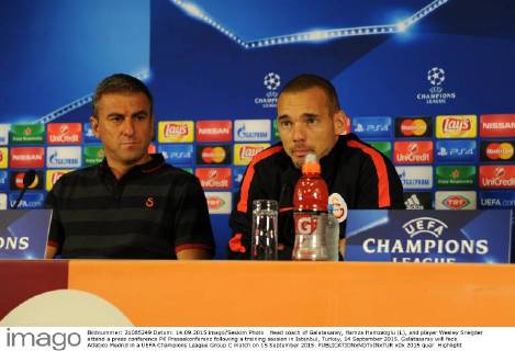 Head coach of Galatasaray, Hamza Hamzaoglu (L), and player Wesley Sneijder attend a press conference PK Pressekonferenz following a training session in Istanbul, Turkey, 14 September 2015. Galatasaray will face Atletico Medrid in a UEFA Champions League Group C match on 15 September 2015. 