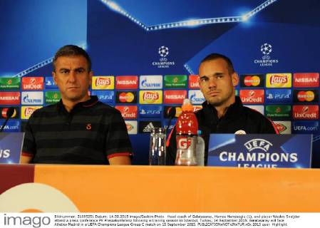 Head coach of Galatasaray, Hamza Hamzaoglu (L), and player Wesley Sneijder attend a press conference PK Pressekonferenz following a training session in Istanbul, Turkey, 14 September 2015. Galatasaray will face Atletico Medrid in a UEFA Champions League Group C match on 15 September 2015. 