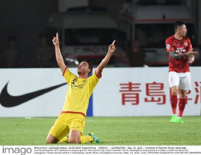(150915) -- GUANGZHOU , Sep. 15, 2015 -- Cristiano of Kashiwa Reysol celebrates scoring during the AFC Champions League quarter-final second leg match between China s Guangzhou Evergrande and Japan s Kashiwa Reysol at Guangzhou Tianhe Sports Centre in Guangzhou, south China s Guangdong Province, Sept. 15, 2015. )(wll) (SP)CHINA-GUANGZHOU-SOCCER-AFC CHAMPIONS LEAGUE-QUARTERFINAL LiuxDawei 