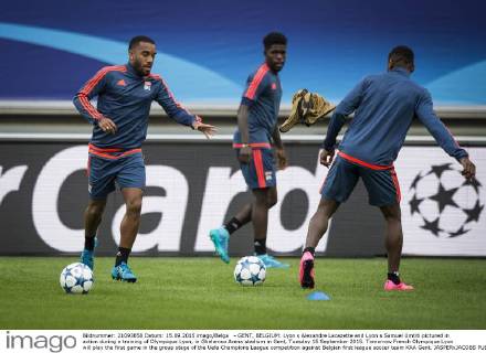 - GENT, BELGIUM: Lyon s Alexandre Lacazette and Lyon s Samuel Umtiti pictured in action during a training of Olympique Lyon, in Ghelamco Arena stadium in Gent, Tuesday 15 September 2015. Tomorrow French Olympique Lyon will play the first game in the group stage of the Uefa Champions League competition against Belgian first league soccer team KAA Gent. JASPERxJACOBS  x04700475x