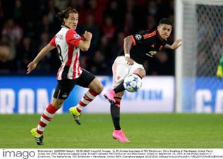 (L-R) Andres Guardado of PSV Eindhoven, Chris Smalling of Manchester United ManU during the UEFA Champions League group B match between PSV Eindhoven and Manchester United on September 15, 2015 at the Philips stadium in Eindhoven, The Netherlands. PSV Eindhoven v Manchester United UEFA Champions League 2015 2016 xVIxLaurensxLindhoutxIVx 4330218