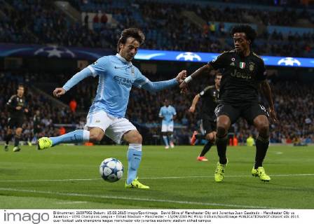 David Silva of Manchester City and Juventus Juan Cuadrado - Manchester City vs Juventus - UEFA Champions League - Etihad Stadium - Manchester - 15 09 2015 Pic Philip Oldham SportImage EDITORIAL USE ONLY. No use with unauthorised audio, video, data, fixture lists, club league logos or live services. Online in-match use limited to 120 images, no video emulation. No use in betting, games or single club league player publications.
