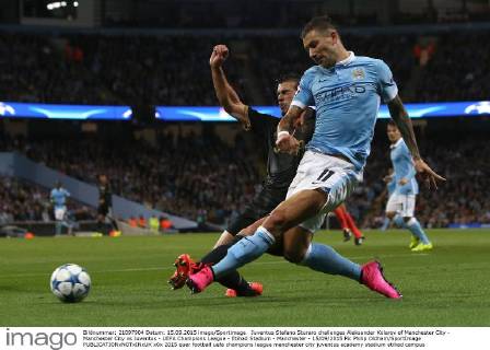 Juventus Stefano Sturaro challenges Aleksander Kolarov of Manchester City - Manchester City vs Juventus - UEFA Champions League - Etihad Stadium - Manchester - 15 09 2015 Pic Philip Oldham SportImage EDITORIAL USE ONLY. No use with unauthorised audio, video, data, fixture lists, club league logos or live services. Online in-match use limited to 120 images, no video emulation. No use in betting, games or single club league player publications.