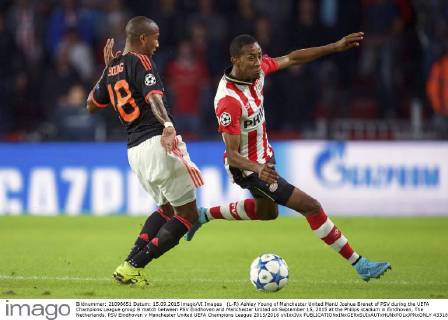(L-R) Ashley Young of Manchester United ManU Joshua Brenet of PSV during the UEFA Champions League group B match between PSV Eindhoven and Manchester United on September 15, 2015 at the Philips stadium in Eindhoven, The Netherlands. PSV Eindhoven v Manchester United UEFA Champions League 2015 2016 xVIxxIVx 4331898