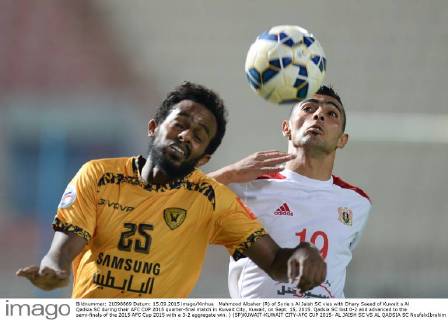 Mahmood Albaher (R) of Syria s Al Jaish SC vies with Dhary Saeed of Kuwait s Al Qadsia SC during their AFC CUP 2015 quarter-final match in Kuwait City, Kuwait, on Sept. 15, 2015. Qadsia SC lost 0-2 and advanced to the semi-finals of the 2015 AFC Cup 2015 with a 3-2 aggregate win. ) (SP)KUWAIT-KUWAIT CITY-AFC CUP 2015- AL JAISH SC VS AL QADSIA SC NoufalxIbrahim 