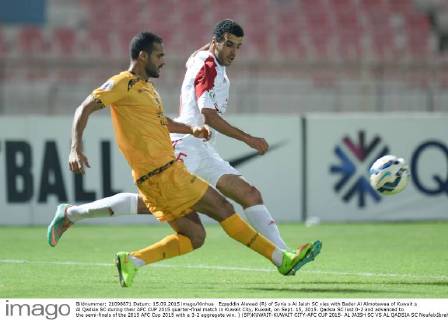 Ezzeddin Alawad (R) of Syria s Al Jaish SC vies with Bader Al Almotawaa of Kuwait s Al Qadsia SC during their AFC CUP 2015 quarter-final match in Kuwait City, Kuwait, on Sept. 15, 2015. Qadsia SC lost 0-2 and advanced to the semi-finals of the 2015 AFC Cup 2015 with a 3-2 aggregate win. ) (SP)KUWAIT-KUWAIT CITY-AFC CUP 2015- AL JAISH SC VS AL QADSIA SC NoufalxIbrahim 