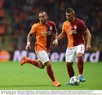 - Wesley Sneijder (L) and Lukas Podolski of Turkey s Galatasaray react during the UEFA Champions League Group C match against Spain s Madrid Athletic in Istanbul, Turkey, on Sept. 15, 2015. Madrid Athletic won 2-0. ) (SP)TURKEY-ISTANBUL-SOCCER-UEFA CHAMPIONS LEAGUE-GALATASARAY VS MADRID ATHLETIC HexCanling 