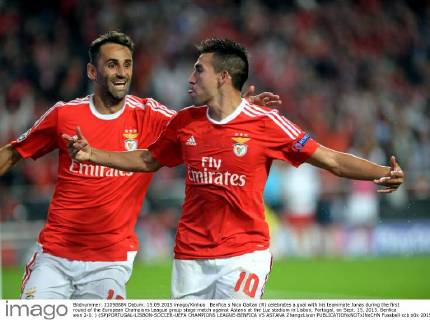 Benfica s Nico Gaitan (R) celebrates a goal with his teammate Jonas during the first round of the European Champions League group stage match against Astana at the Luz stadium in Lisbon, Portugal, on Sept. 15, 2015. Benfica won 2-0. ) (SP)PORTUGAL-LISBON-SOCCER-UEFA CHAMPIONS LEAGUE-BENFICA VS ASTANA ZhangxLiyun 
