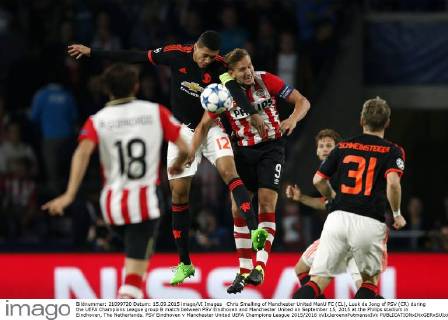 Chris Smalling of Manchester United ManU FC (CL), Luuk de Jong of PSV (CR) during the UEFA Champions League group B match between PSV Eindhoven and Manchester United on September 15, 2015 at the Philips stadium in Eindhoven, The Netherlands. PSV Eindhoven v Manchester United UEFA Champions League 2015 2016 xVIxJeroenxPutmansxIVx 4333033