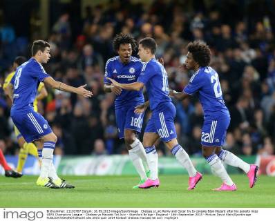 Chelsea s Loic Remy and Oscar try to console Eden Hazard after his penalty miss UEFA Champions League - Chelsea vs Maccabi Tel Aviv - Stamford Bridge - England - 16th September 2015 - Picture David Klein Sportimage EDITORIAL USE ONLY. No use with unauthorised audio, video, data, fixture lists, club league logos or live services. Online in-match use limited to 120 images, no video emulation. No use in betting, games or single club league player publications.