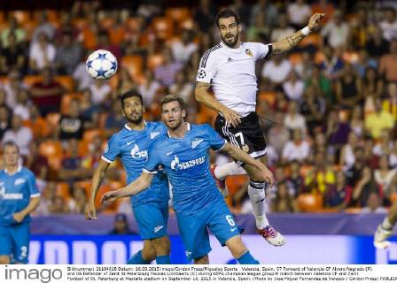 Valencia, Spain. 07 Forward of Valencia CF Alvaro Negredo (R) and 06 Defender of Zenit St Petersburg Nicolas Lombaerts (C) during UEFA champion league group H match between Valencia CF and Zenit Football of St. Peterburg at Mestalla stadium on September 16, 2015 in Valencia, Spain. (Photo by Jose Miguel Fernandez de Velasco Cordon Press) 