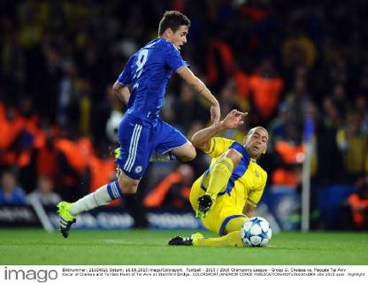 Football - 2015 2016 Champions League - Group G: Chelsea vs. Maccabi Tel Aviv Oscar of Chelsea and Tal Ben Haim of Tel Aviv at Stamford Bridge. COLORSPORT ANDREW COWIE 
