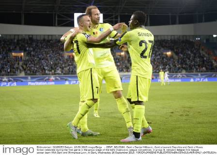 - GENT, BELGIUM: Gent s Danijel Milicevic, Gent s Laurent Depoitre and Gent s Moses Simon celebrate during the first game in the group stage of the Uefa Champions League competition, in group H, between Belgian first league soccer team KAA Gent and Olympique Lyon, in Gent, Wednesday 16 September 2015. YORICKxJANSENS  x04701624x