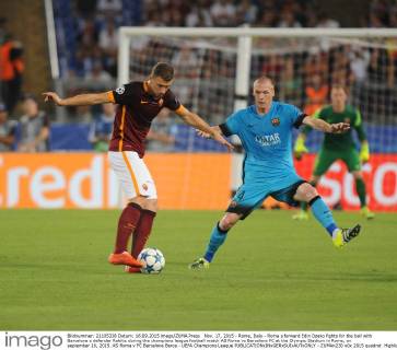 Nov. 17, 2015 - Rome, Italy - Roma s forward Edin Dzeko fights for the ball with Barcelona s defender Rakitic during the champions league football match AS Roma vs Barcelona FC at the Olympic Stadium in Rome, on september 16, 2015. AS Roma v FC Barcelona Barca - UEFA Champions League  - ZUMAn230