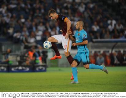 Sept. 16, 2015 - Rome, Italy - Roma s forward Edin Dzeko fights for the ball with Barcelona s midfielder Mascherano during the champions league football match AS Roma vs Barcelona FC at the Olympic Stadium in Rome, on september 16, 2015. AS Roma v FC Barcelona Barca - UEFA Champions League  - ZUMAn230