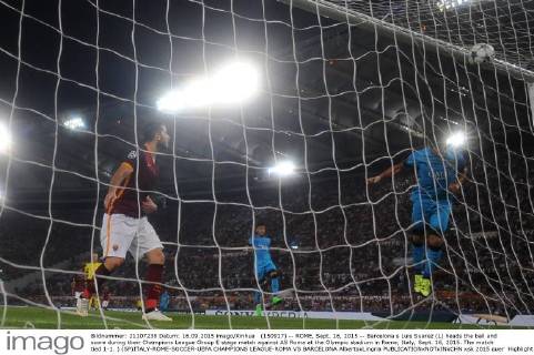 (150917) -- ROME, Sept. 16, 2015 -- Barcelona s Luis Suarez (L) heads the ball and score during their Champions League Group E stage match against AS Roma at the Olympic stadium in Rome, Italy, Sept. 16, 2015. The match tied 1-1. ) (SP)ITALY-ROME-SOCCER-UEFA CHAMPIONS LEAGUE-ROMA VS BARCELONA AlbertoxLingria 