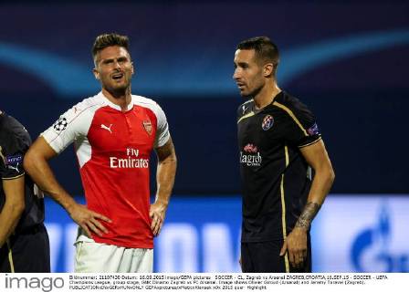 SOCCER - CL, Zagreb vs Arsenal ZAGREB,CROATIA,16.SEP.15 - SOCCER - UEFA Champions League, group stage, GNK Dinamo Zagreb vs FC Arsenal. Image shows Olivier Giroud (Arsenal) and Jeremy Taravel (Zagreb). GEPAxpictures xMaticxKlansek