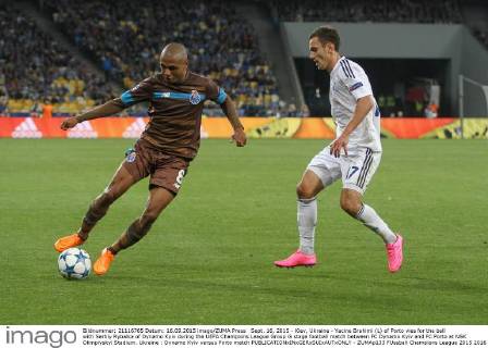 Sept. 16, 2015 - Kiev, Ukraine - Yacine Brahimi (L) of Porto vies for the ball with Serhiy Rybalka of Dynamo Kyiv during the UEFA Champions League Group G stage football match between FC Dynamo Kyiv and FC Porto at NSK Olimpiyskyi Stadium. Ukraine : Dynamo Kyiv versus Porto match - ZUMAp133
