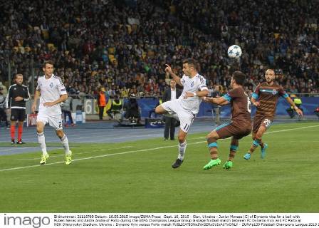Sept. 16, 2015 - Kiev, Ukraine - Junior Moraes (C) of Dynamo vies for a ball with Ruben Neves and Andre Andre of Porto during the UEFA Champions League Group G stage football match between FC Dynamo Kyiv and FC Porto at NSK Olimpiyskyi Stadium. Ukraine : Dynamo Kyiv versus Porto match - ZUMAp133