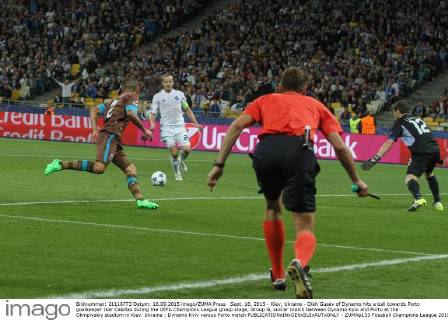 Sept. 16, 2015 - Kiev, Ukraine - Oleh Gusev of Dynamo hits a ball towards Porto goalkeeper Iker Casillas during the UEFA Champions League group stage, Group G, soccer match between Dynamo Kyiv and Porto at the Olimpiyskiy stadium in Kiev. Ukraine : Dynamo Kyiv versus Porto match - ZUMAp133