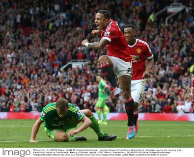 Memphis Depay of Manchester United ManU celebrates scoring the opening goal - Manchester United vs. Sunderland - Barclay s Premier League - Old Trafford - Manchester - 26 09 2015 Pic Philip Oldham SportImage EDITORIAL USE ONLY. No use with unauthorised audio, video, data, fixture lists, club league logos or live services. Online in-match use limited to 120 images, no video emulation. No use in betting, games or single club league player publications.
