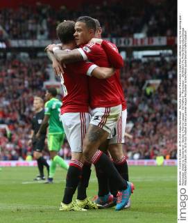 Memphis Depay of Manchester United ManU celebrates scoring the opening goal - Manchester United vs. Sunderland - Barclay s Premier League - Old Trafford - Manchester - 26 09 2015 Pic Philip Oldham SportImage EDITORIAL USE ONLY. No use with unauthorised audio, video, data, fixture lists, club league logos or live services. Online in-match use limited to 120 images, no video emulation. No use in betting, games or single club league player publications.