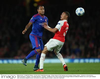 Felipe Pardo of Olympiacos and Arsenal s Kieran Gibbs - Arsenal vs Olympiacos - UEFA Champion s League - Emirates Stadium - London - 29 09 2015 Pic Philip Oldham SportImage EDITORIAL USE ONLY. No use with unauthorised audio, video, data, fixture lists, club league logos or live services. Online in-match use limited to 120 images, no video emulation. No use in betting, games or single club league player publications.