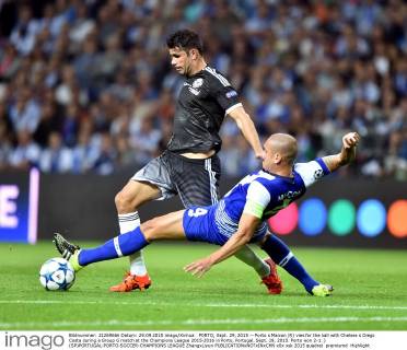 PORTO, Sept. 29, 2015 -- Porto s Maicon (R) vies for the ball with Chelsea s Diego Costa during a Group G match at the Champions League 2015-2016 in Porto, Portugal, Sept. 29, 2015. Porto won 2-1. ) (SP)PORTUGAL-PORTO-SOCCER-CHAMPIONS LEAGUE ZhangxLiyun 