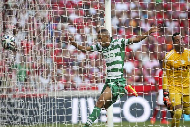Aug. 31, 2014 - Lisbon, Portugal - Sporting«s forward Islam Slimani scores a goal during the Portuguese Liga football match SL Benfica vs Sporting CP at Luz stadium in Lisbon on August 31, 2014. NURPHOTO CARLOS COSTA FBL-LIGA-SPORTING-BENFICA - ZUMAn230