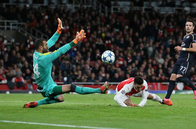 Arsenal s Mesut Ozil scoring his sides opening goal UEFA Champions League- Arsenal v Dinamo Zagreb - Emirates Stadium - England - 24th November 2015 - Picture David Klein Sportimage EDITORIAL USE ONLY. No use with unauthorised audio, video, data, fixture lists, club league logos or live services. Online in-match use limited to 120 images, no video emulation. No use in betting, games or single club league player publications.
