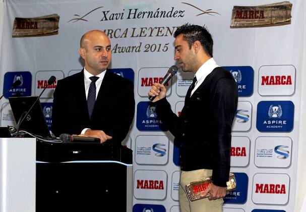 The former FC Barcelona player, Xavi Hernandez, receives the Marca Leyenda award in Doha. In this picture, Bassel Tabbar and Xavi. xFOTOxCHEMAxREYx 