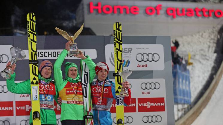 NORDIC SKIING - FIS WC Bischofshofen, Four Hills Tournament BISCHOFSHOFEN,AUSTRIA,06.JAN.16 - NORDIC SKIING, Ski jumping Skispringen Ski nordisch - FIS World Cup, Four Hills Tournament, large hill, men, award ceremony. Image shows the rejoicing of Severin Freund (GER), Peter Prevc (SLO) and Michael Hayboeck (AUT). Keywords: trophy. GEPAxpictures xThomasxBachun