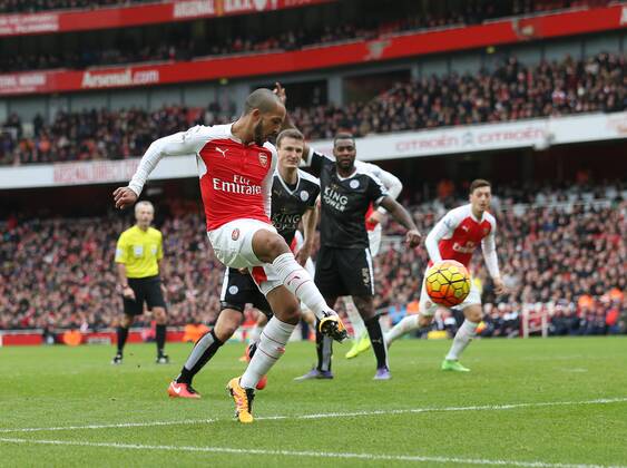 Arsenal s Theo Walcott scoring his sides opening goal Barclays Premier League - Arsenal vs Leicester City - Stamford Bridge - England - 14th February 2016 - Picture David Klein Sportimage EDITORIAL USE ONLY. No use with unauthorised audio, video, data, fixture lists, club league logos or live services. Online in-match use limited to 120 images, no video emulation. No use in betting, games or single club league player publications.