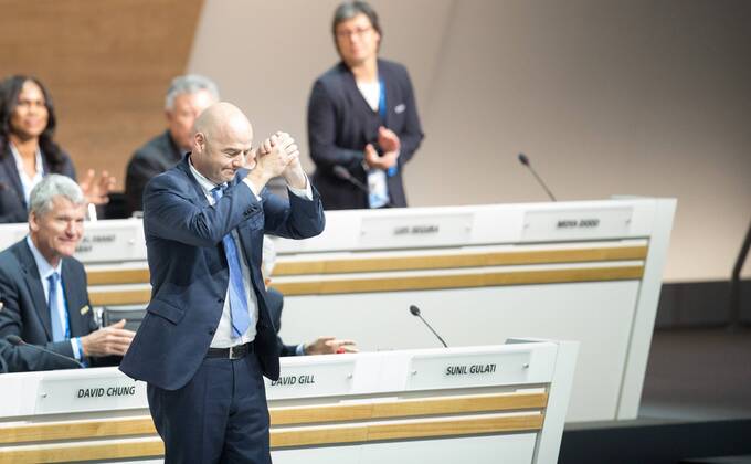 (160226) -- ZURICH, Feb. 26, 2016 -- Gianni Infantino (front) reacts after being elected as new FIFA President during the Extraordinary FIFA Congress 2016 in Zurich, Switzerland, Feb. 26, 2016. UEFA General Secretary Gianni Infantino from Switzerland won 115 of the 207 eligible votes in the second round, beating Sheikh Salman of Bahrain who received 88 votes. ) (SP)SWITZERLAND-ZURICH-EXTRAORDINARY FIFA CONGRESS 2016 XuxJinquan 