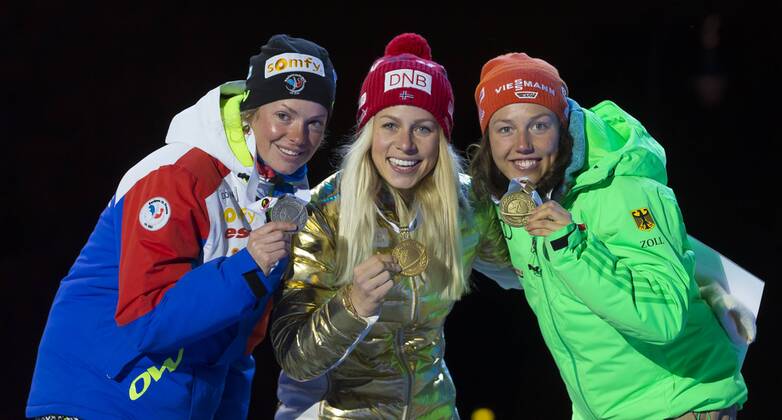 05.03.2016. Oslo Holmenkollen, Oslo, Norway. IBU Biathlon World Cup. Day One. Marie Dorin Habert of France second place, Tiril Eckhoff of Norway first place and Laura Dahlmeier of Germany third place winner of ladies 7.5km at the medal ceremony during the IBU World Championships Biathlon in Holmenkollen Oslo, Norway. xNigelxWaldronx  ActionPlus11715024